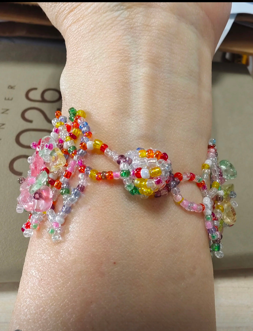 Spring/Summer "Dopamine-style" colorful woven bracelet featuring faux crushed-stone crystals—a sweet, unique, and stylish accessory.